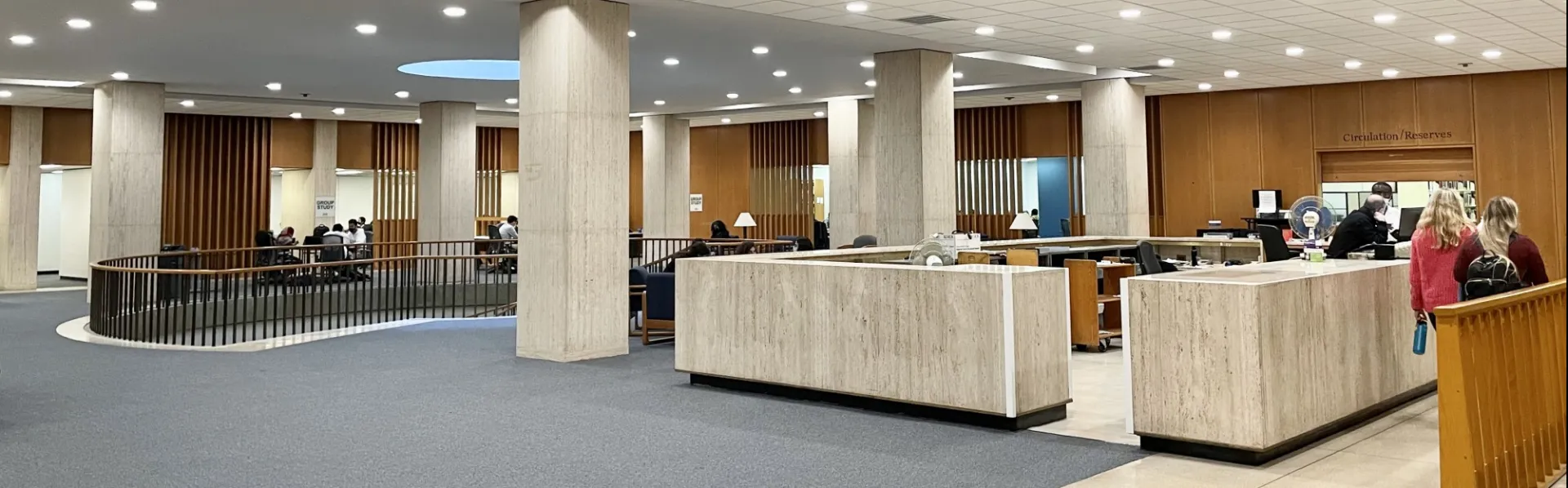 Students and staff in Lehman Social Sciences Library 