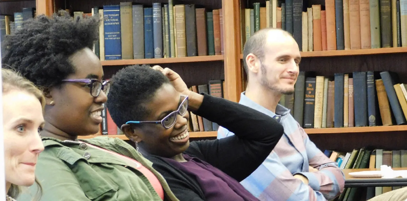 Faculty and students listen to panel discussion