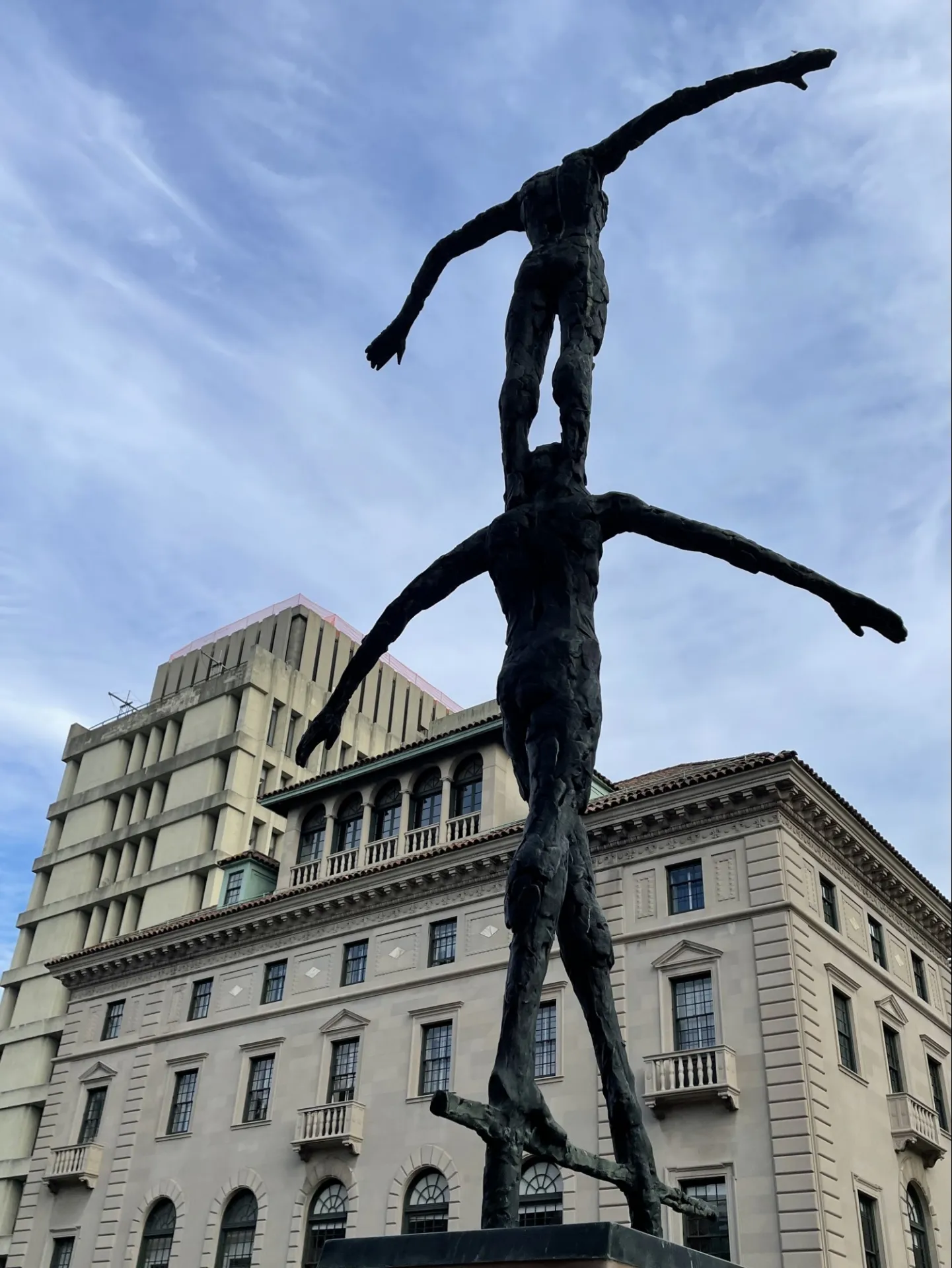 Image of sculpture titled Tightrope Walker. Designed as a tribute to General William J. "Wild Bill" Donovan, a graduate of Columbia College and Columbia Law School, Tightrope Walker was created by the Dutch artist Kees Verkade and installed on Revson Plaza in 1979.